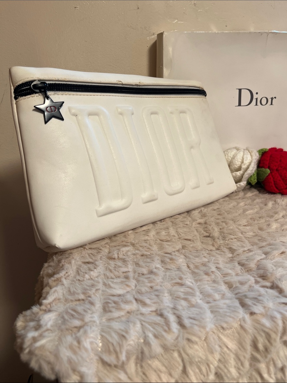 Dior Embossed Logo Cosmetic Case with Pom-Pom & Star Charm